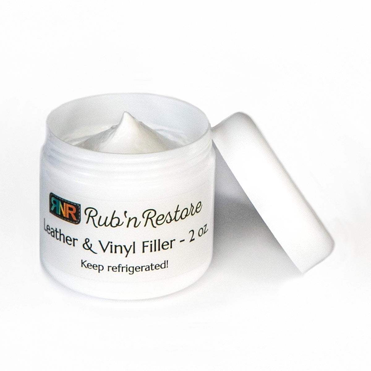 Picture of open tub of leather filler and vinyl repair putty showing creamy texture