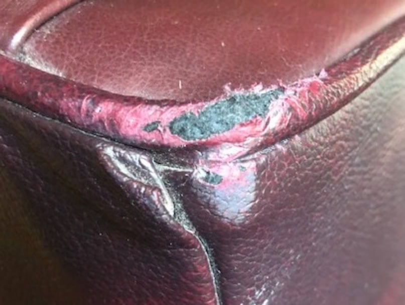 Picture of vinyl welting that has been abraded and worn exposing the fabric substrate