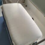 Picture of boat vinyl cushion restored with marine white vinyl paint