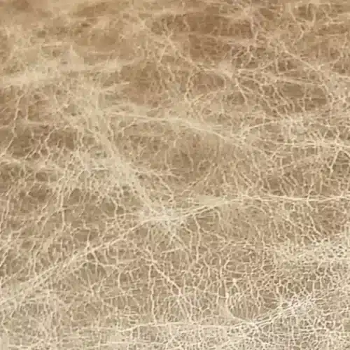 Close-up photo showing natural variation of dyed unfinished aniline leather