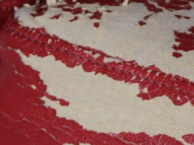 Polyester fabric whose 'skin' has peeled away