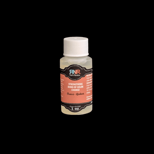 Picture of bottle of cross-linker adhesion additive for changing color of leather or vinyl