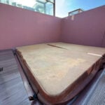 Picture of weathered vinyl Jacuzzi cover before protecting with Rub 'n Restore
