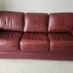 Picture of worn burgundy leather couch