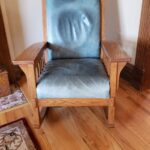 Picture of faded and stained blue aniline leather chair