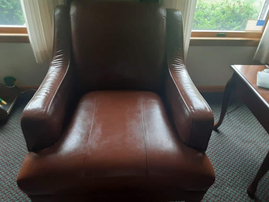 Picture of leather club chair after repair with leather filler and Rub n Restorea