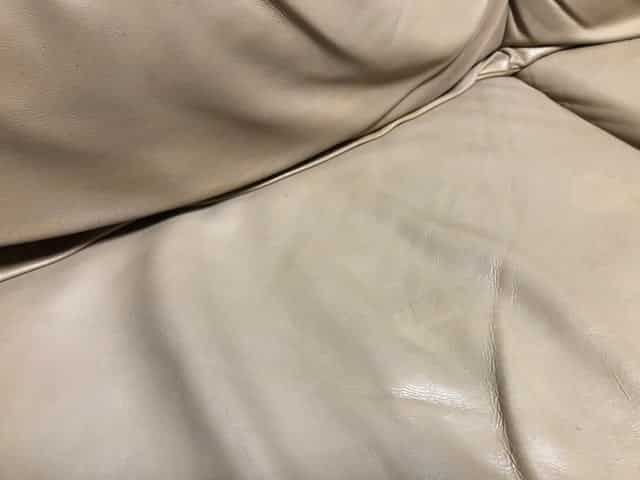 Close-up after using Soft Filler to repair leather couch