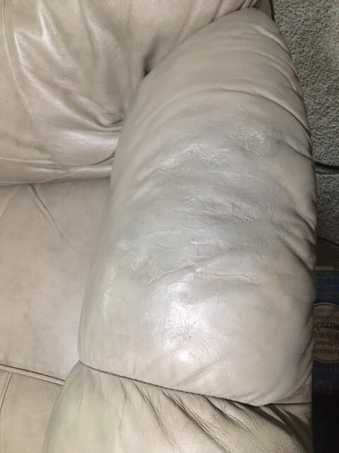 Picture of leather arm after repair with filler and new color by Rub n Restore
