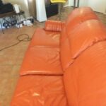 Picture of tangerine orange leather sofa refinished with Persimmon color RubnRestore leather paint