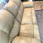 Picture of dirty, discolored leather couch