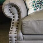 Picture of decorative brass tacks or nails on leather furniture
