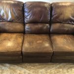 Picture of worn brown leather couch