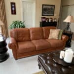 Picture of faded red leather couch