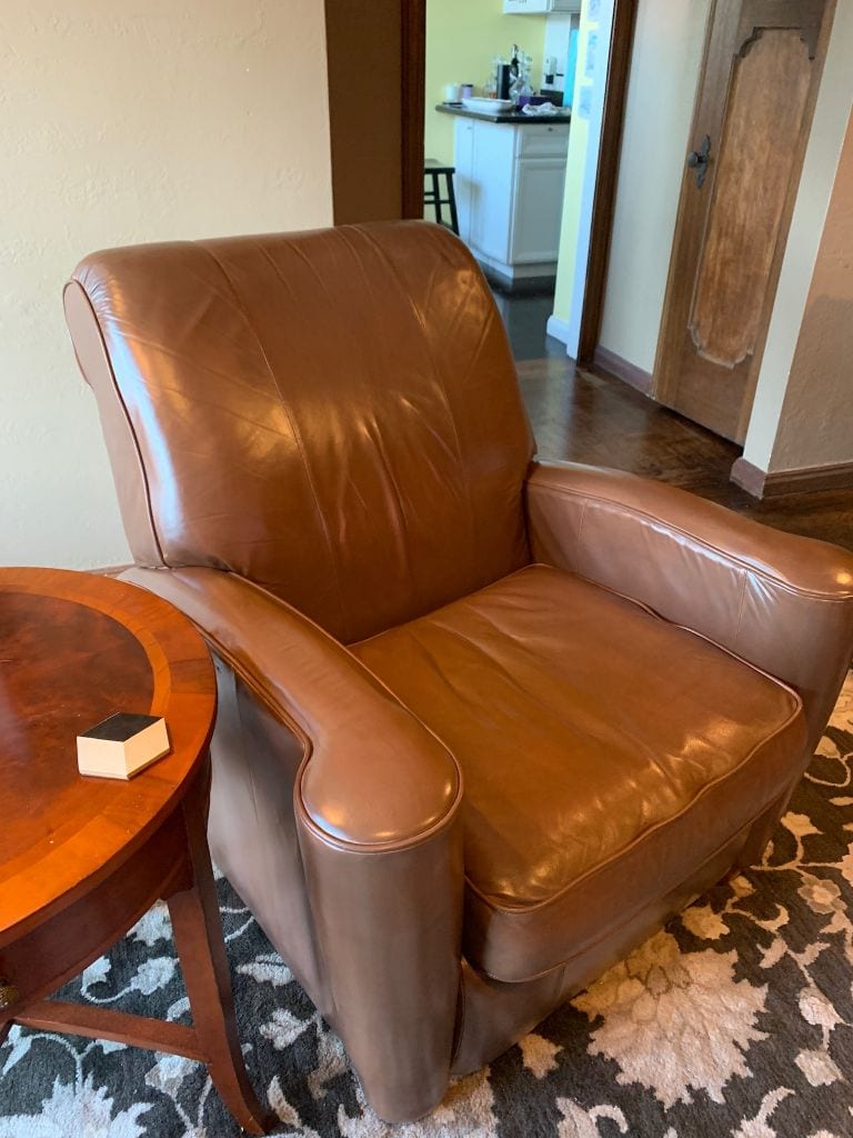 Picture of leather chair after filler repair and Walnut Rub n Restore