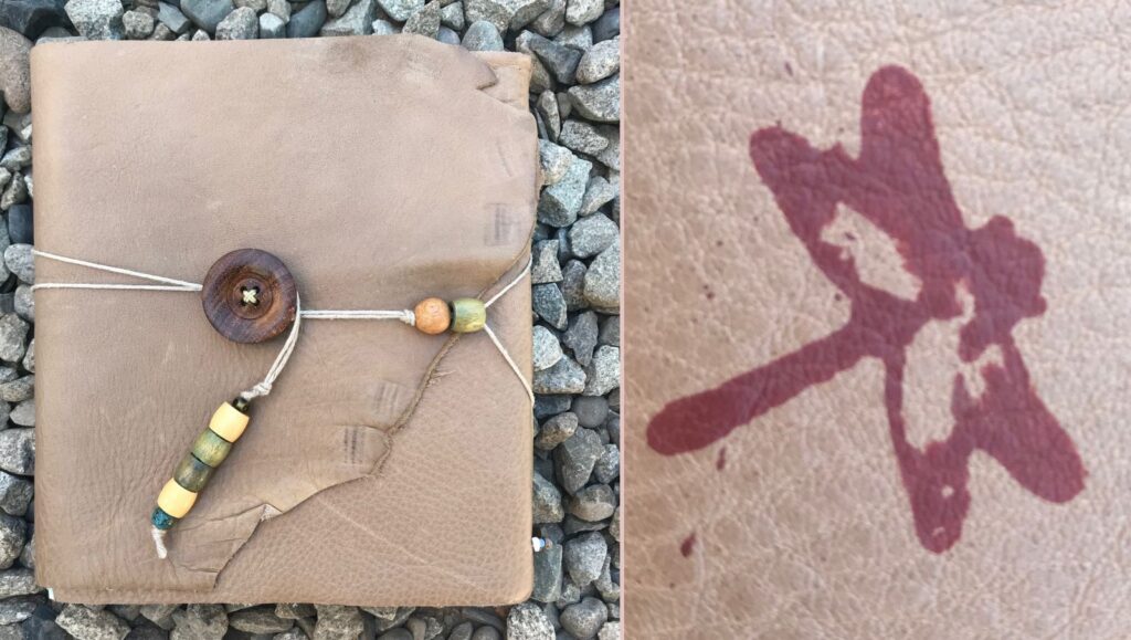 Leather journal painted with dragonfly using Rub 'n Restore