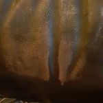 Close-up photo of discoloration at head on leather recliner