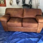 Picture of leather loveseat before RubnRestore