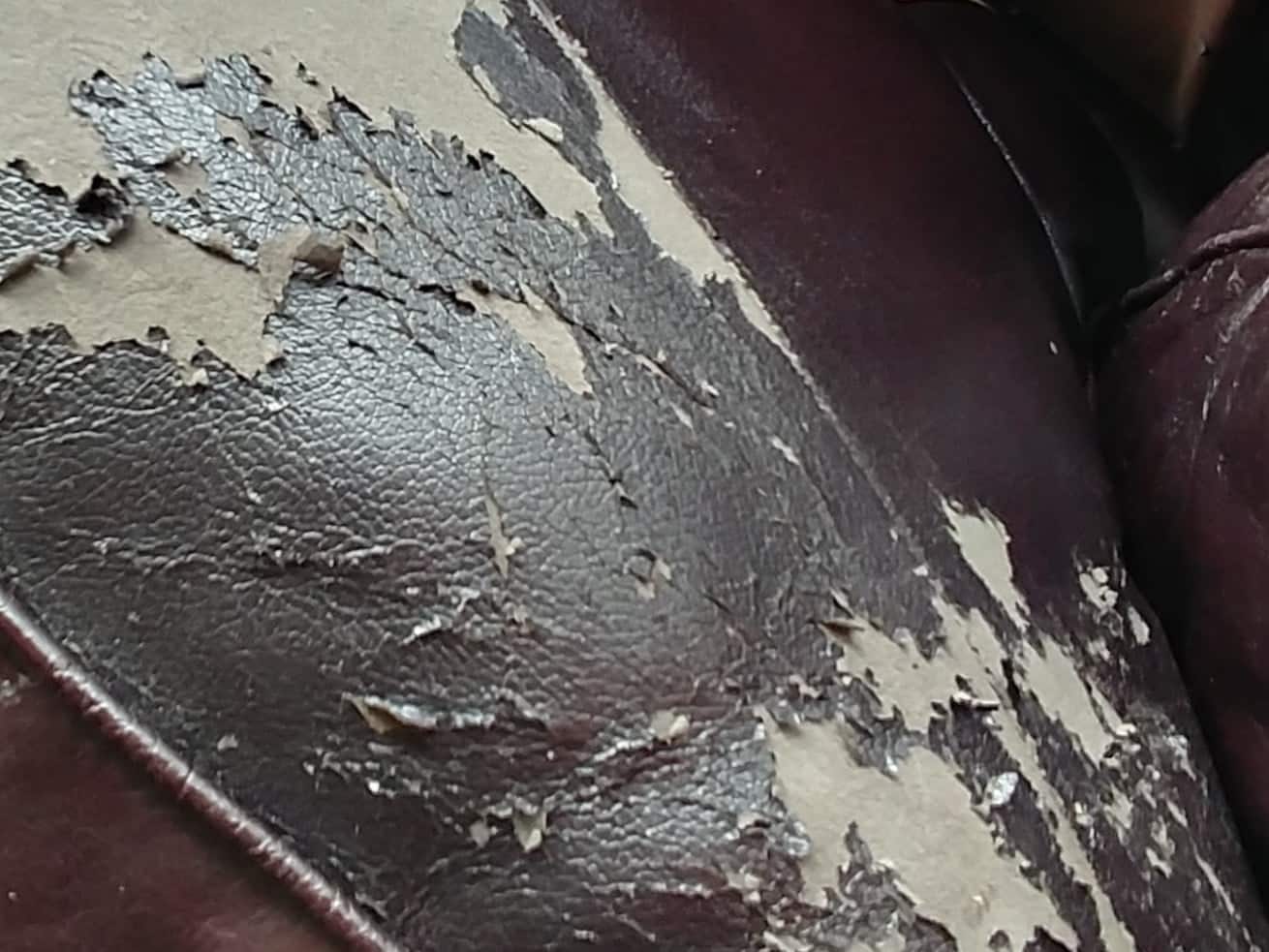 Picture of peeling, flaking polyurethane or bonded leather