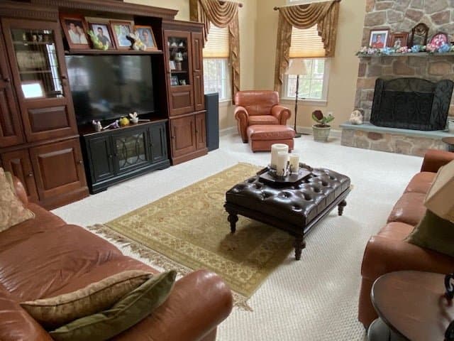 Photo of a living room with a restored natuzzi furniture set - sofas & chair