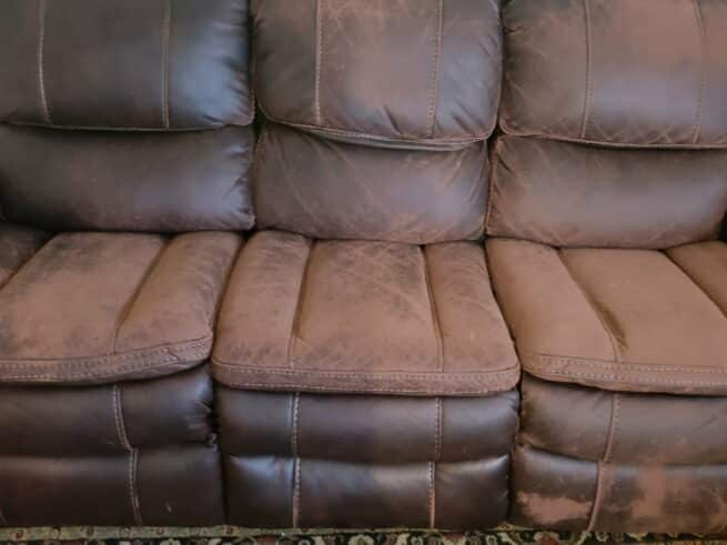worn-faux-leather-couch-polyester-fabric-exposed-web-1-655x491.jpg
